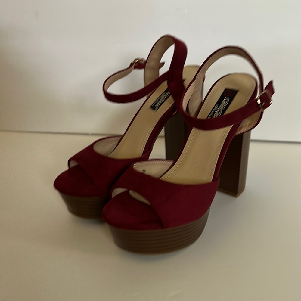 Wine colored suede platform sandals with faux wood heels